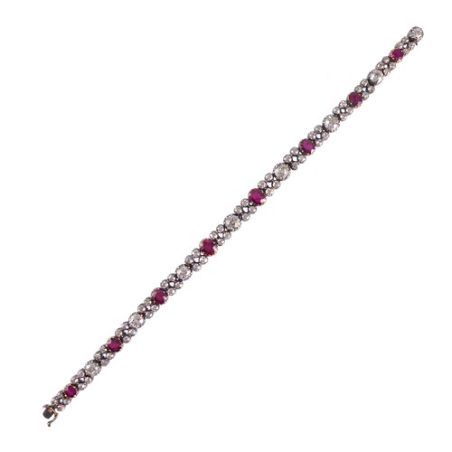 Late 19th century ruby and diamond line bracelet, c.1890, formerly belonging to the Royal House of the Bourbon Parma family, with eight graduated cushion cut Burma rubies alternating seven old round brilliant and cushion cut diamonds,